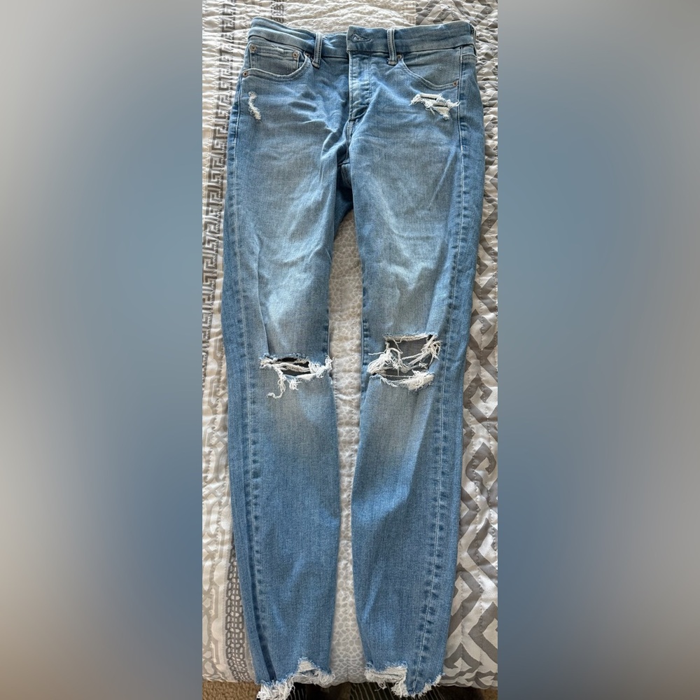 Light Blue Distressed Women's Jeans - Classic Ripped Knee Style